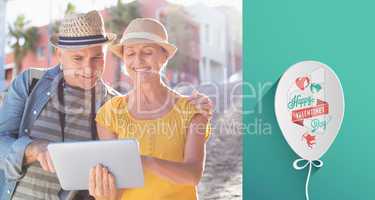Composite image of happy tourist couple using tablet pc in the c