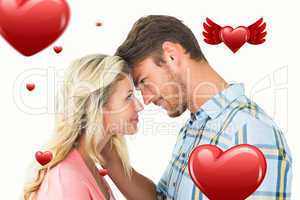 Composite image of attractive couple smiling at each other