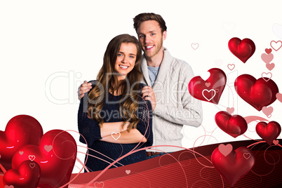 Composite image of portrait of smiling young couple