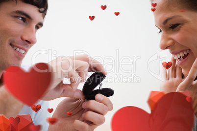 Composite image of close up of man making a proposal of marriage
