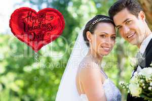 Composite image of loving bride and groom in garden