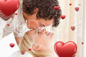 Composite image of close up of a man kissing his fiance on the f