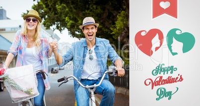 Composite image of hip young couple going for a bike ride