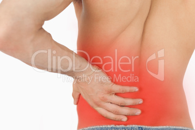 Young man experiencing back pain