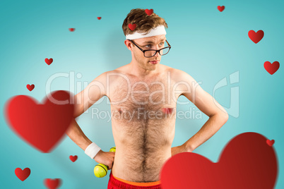 Composite image of geeky shirtless hipster posing with dumbbell Composite image of geeky shirtless hipster posing with dumbbell