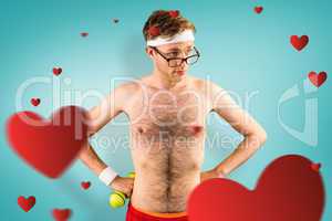 Composite image of geeky shirtless hipster posing with dumbbell