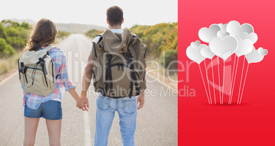 Composite image of hiking couple standing on countryside road