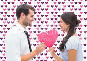 Composite image of pretty brunette giving boyfriend her heart