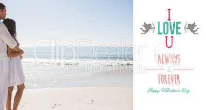 Composite image of attractive couple looking out at sea