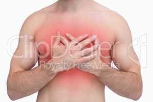 Midsection of shirtless man with chest pain