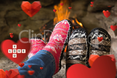 Composite image of close up of romantic legs in socks in front o