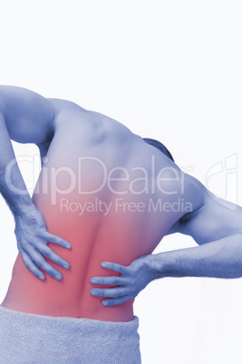 Rear view of shirtless man with back pain