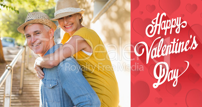 Composite image of happy mature couple having fun in the city