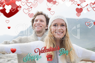 Composite image of casual young couple stretching hands out outd