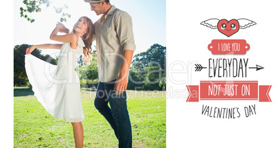 Composite image of cute couple dancing in the park and laughing