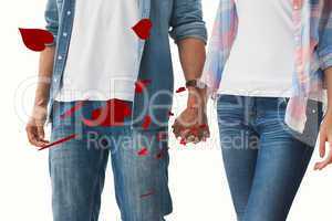 Composite image of hip young couple holding hands