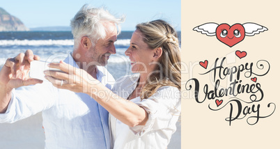 Composite image of married couple at the beach together taking a