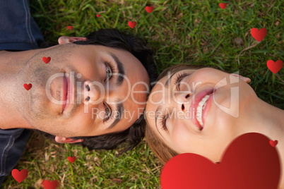 Composite image of close up of two friends looking at each other