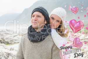 Composite image of romantic young couple together on a rocky lan