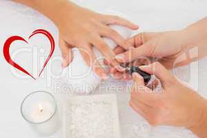 Composite image of nail technician painting customers nails