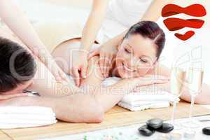 Composite image of positive young couple enjoying a back massage