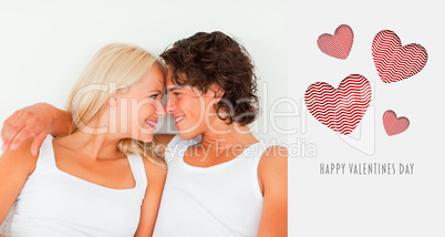 Composite image of in love couple looking at each other