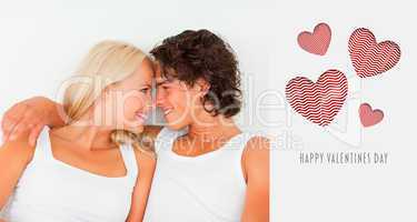 Composite image of in love couple looking at each other