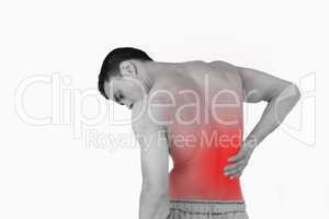 Back view of man suffering from back pain