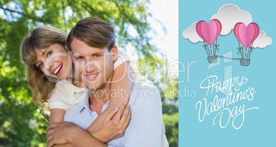 Composite image of man giving his pretty girlfriend a piggy back