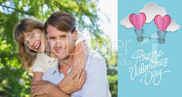 Composite image of man giving his pretty girlfriend a piggy back