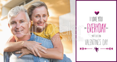 Composite image of happy mature couple having fun in the city