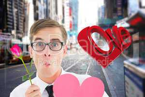 Composite image of romantic geeky hipster