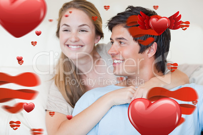 Composite image of close up of a young couple posing