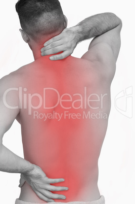 Rear view of shirtless man with neck pain over