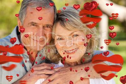 Composite image of lovers in the park