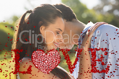 Composite image of loving and happy couple at park