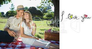Composite image of cute couple drinking white wine on a picnic s