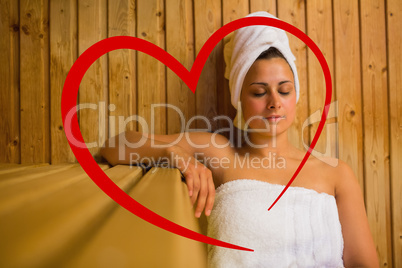 Composite image of calm woman relaxing in a sauna