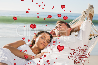 Composite image of peaceful couple napping in a hammock