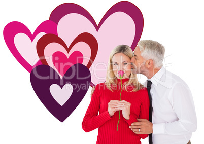 Composite image of handsome man giving his wife a kiss on cheek