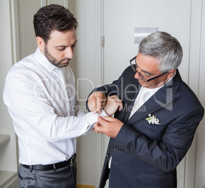 Young Italian groom with his father