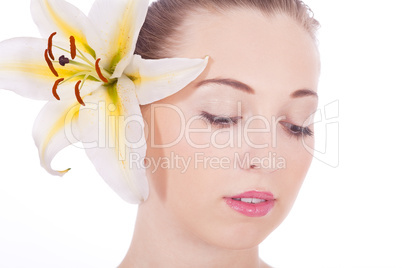 young beautiful woman portrait with white flower