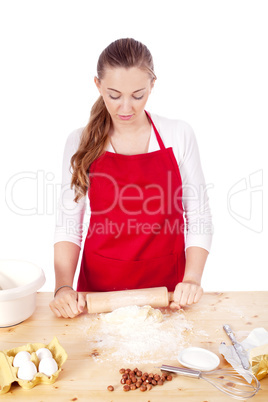 beautiful woman is baking cookies for christmas