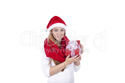 young smiling girl with red hat and present christmas