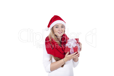 young smiling girl with red hat and present christmas