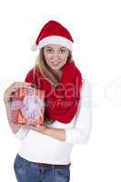 young smiling girl with red hat and present christmas