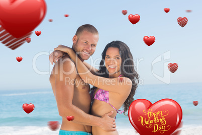 Composite image of attractive young couple hugging each other