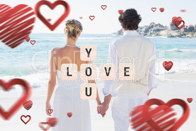 Composite image of bride and groom holding hands looking out to