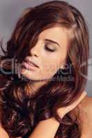 young attractive bunette woman with glossy shiny hair