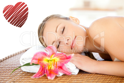 Composite image of portrait of a cute woman having a massage